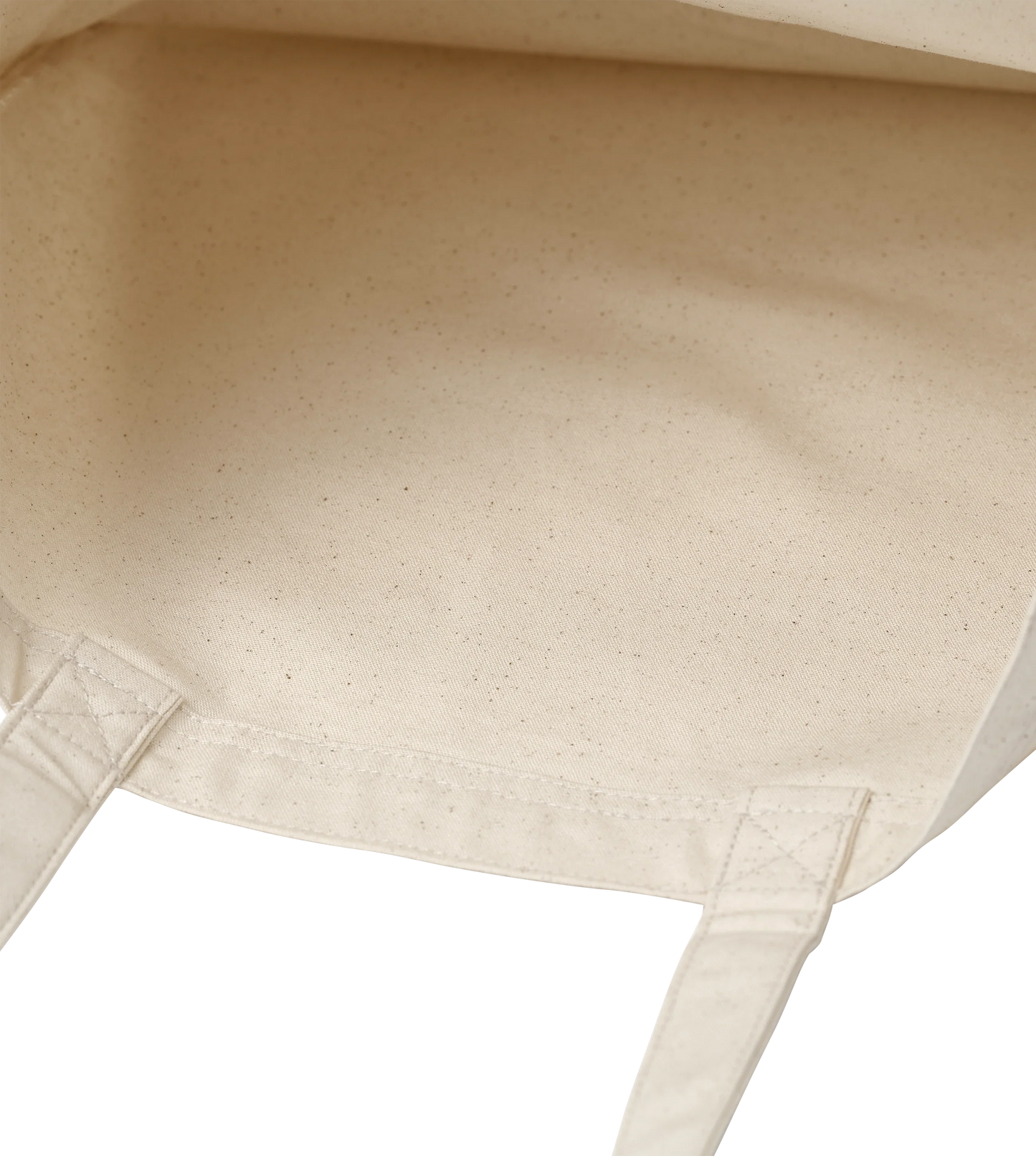 Close-up inside view of a white cotton tote bag with reinforced stitched handles